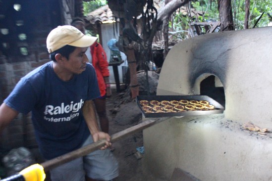 Making rosquillas (cookies with cane sugar topping).