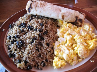 Gallo Pinto served with a tortilla and huevos revueltos (scrambled eggs)